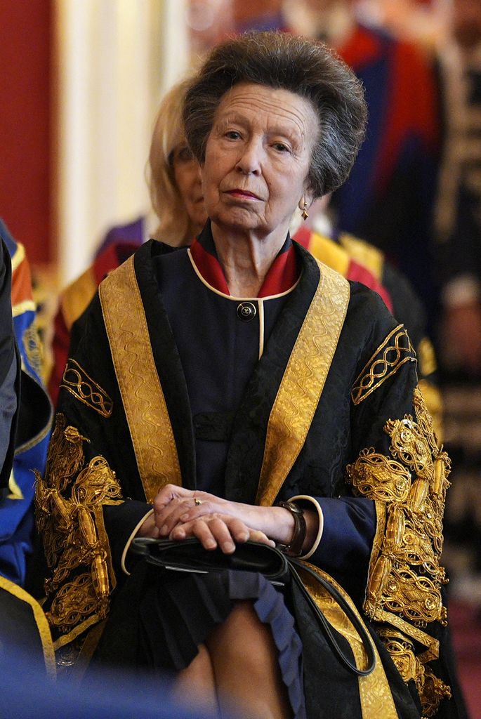 Princess Anne listens during the presentation ceremony