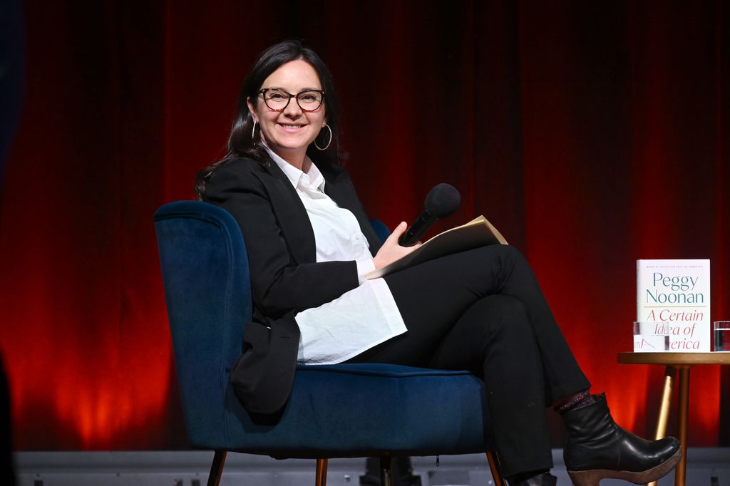 bari weiss sitting smiling