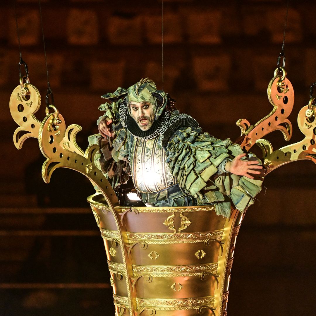 An artist performs during the closing ceremony of the Milano Cortina 2026 Winter Olympic Games at the Verona Arena in Verona, northern Italy, on February 22, 2026.