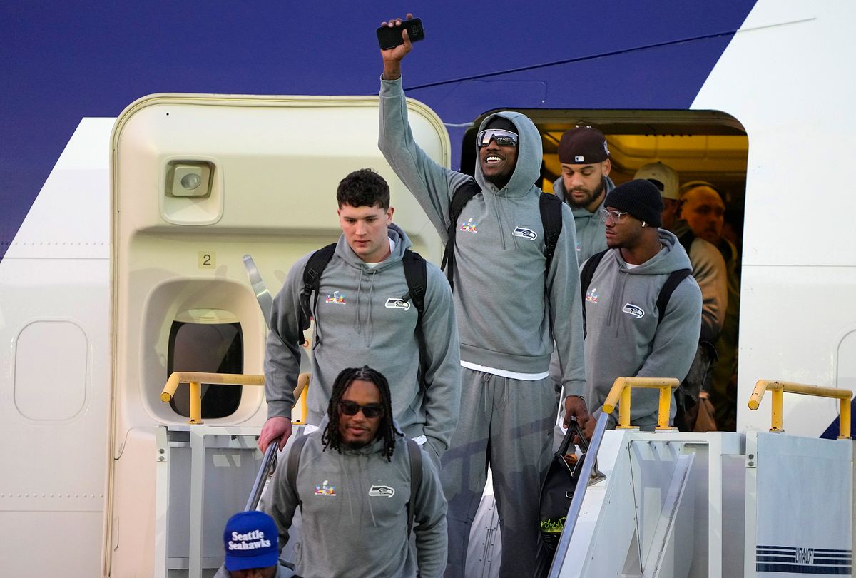 Seattle Seahawks players exit the plane arriving at San Jose Mineta International Airport ahead of Super Bowl LX on February 01, 2026, in San Jose, California.