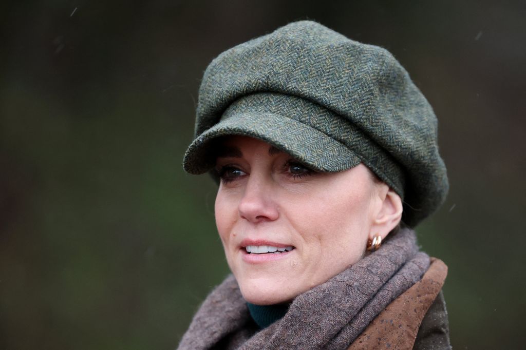 Britain's Catherine, Princess of Wales, looks on during a guided walk in the Peak District with members of the Mind Over Mountains charity, near Curbar, northern England on January 27, 2026. (Photo by Ian Vogler / POOL / AFP via Getty Images)