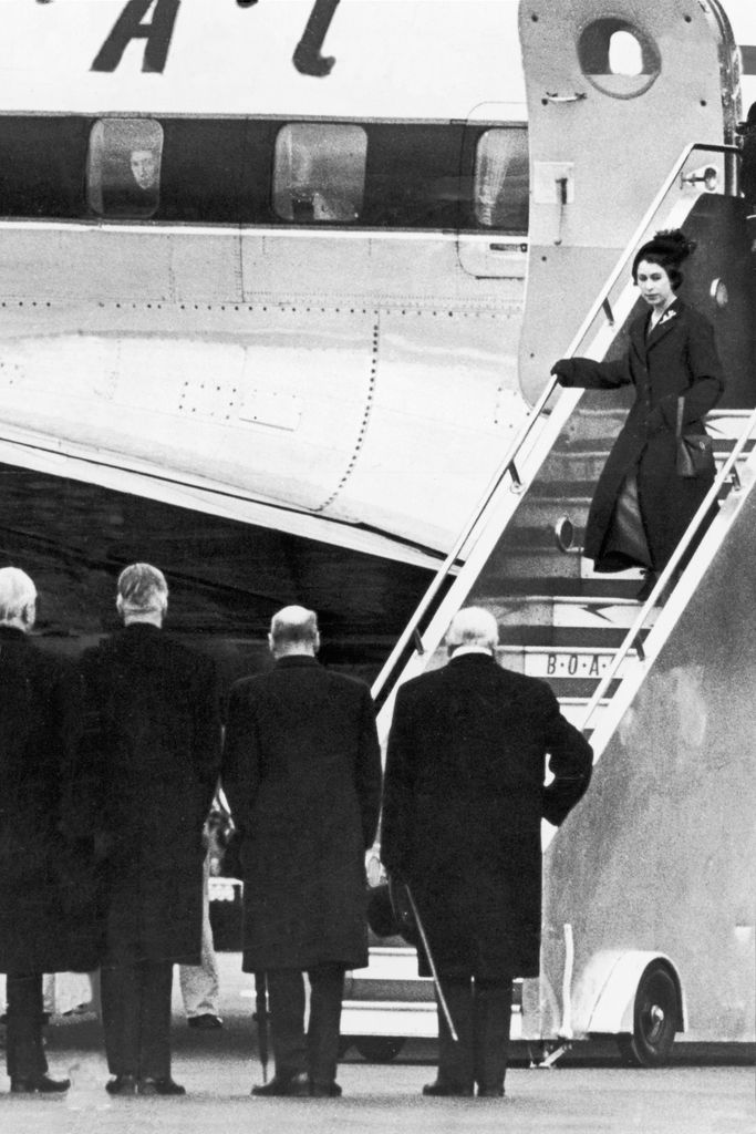 The new monarch waited to change into a black outfit before disembarking the plane at Heathrow