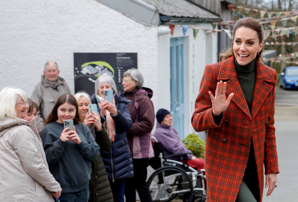 The Princess of Wales waves as she departs Melin Tregwynt, a woollen mill weaving traditional Welsh designs in a remote wooded valley on the Pembrokeshire coast on 3 February