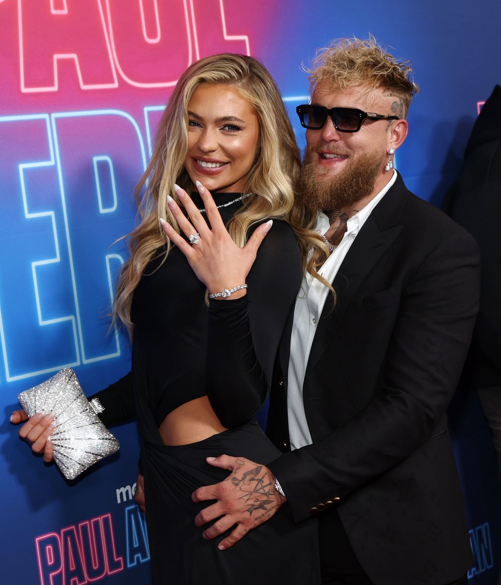 Jutta Leerdam and Jake Paul, ring detail, attend Max's "Paul American" premiere on March 26, 2025 in New York City.