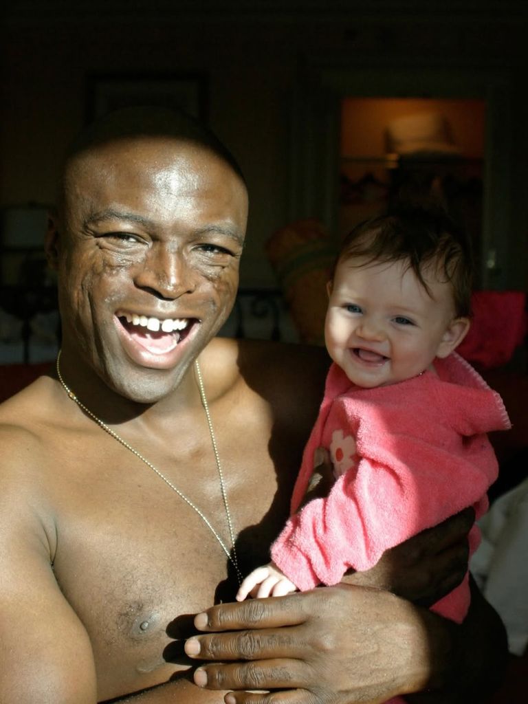 Leni Klum as baby cradled by Seal