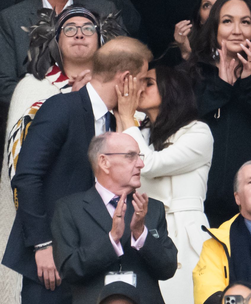 Prince Harry and Meghan kiss during the opening ceremony of the 2025 Invictus Games at BC Place on February 08, 2025