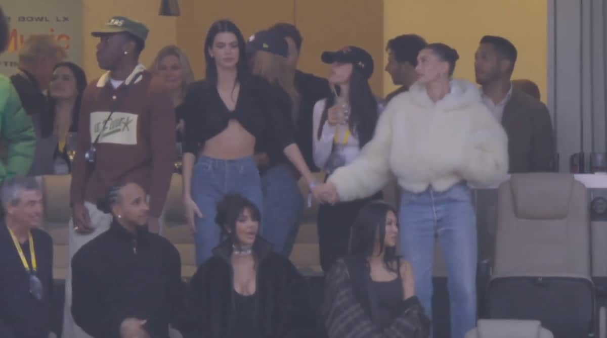 Kendall Jenner did not take center stage during Super Bowl LX, but by the time Bad Bunny wrapped his halftime show, all eyes had found her anyway.