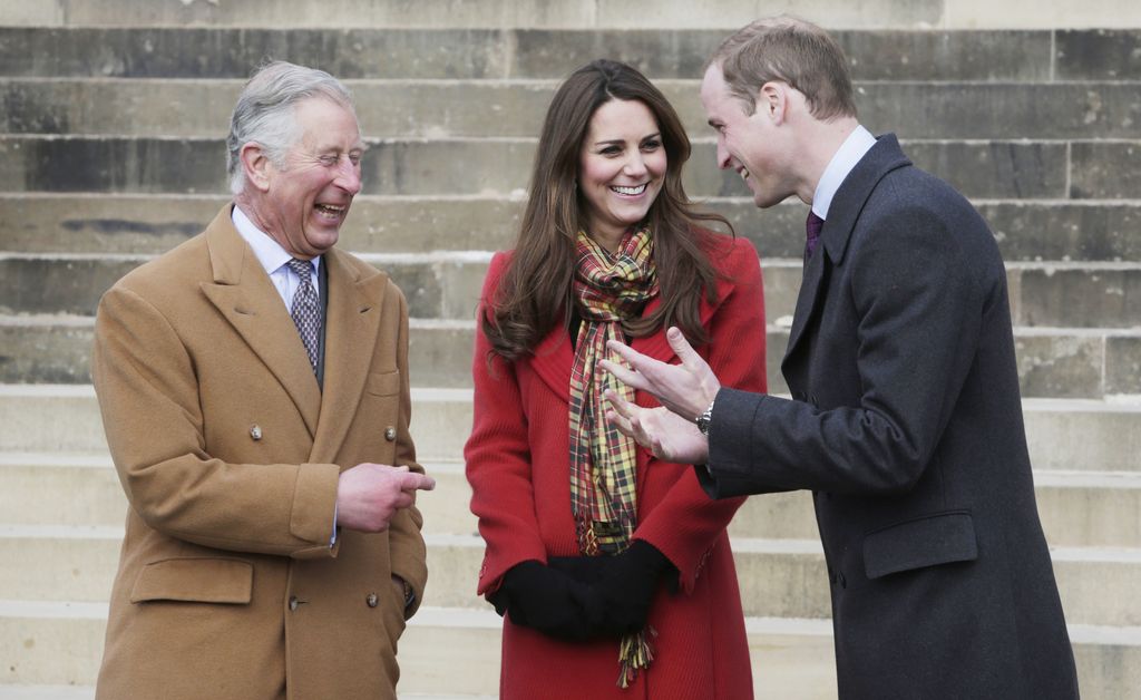 AYRSHIRE, UNITED KINGDOM- MARCH 05: Prince Charles, Prince of Wales, known as the Duke of Rothesay, Catherine, Duchess of Cambridge, known as the Countess of Strathearn, and Prince William, Duke of Cambridge, known as the Earl of Strathearn, when in Scotland during a visit to Dumfries House on March 05, 2013 in Ayrshire, Scotland. The Duke and Duchess of Cambridge braved the bitter cold to attend the opening of an outdoor centre in Scotland today. The couple joined the Prince of Wales at Dumfries House in Ayrshire where Charles has led a regeneration project since 2007. Hundreds of locals and 600 members of youth groups including the Girl Guides and Scouts turned out for the official opening of the Tamar Manoukin Outdoor Centre. (Photo by Danny Lawson - WPA Pool/Getty Images)