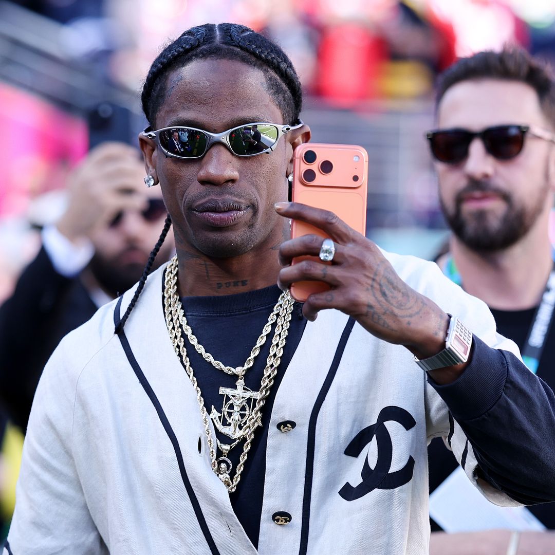 Travis Scott is seen on the sidelines prior to the start of Super Bowl LX between the Seattle Seahawks and the New England Patriots at Levi's Stadium on February 08, 2026 in Santa Clara, California.