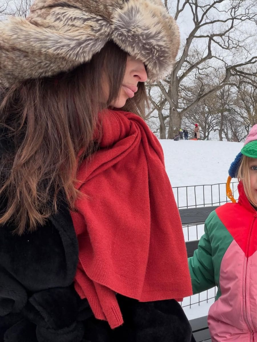 Emily Ratajkowski bares midriff during snow-day outing with son Sly