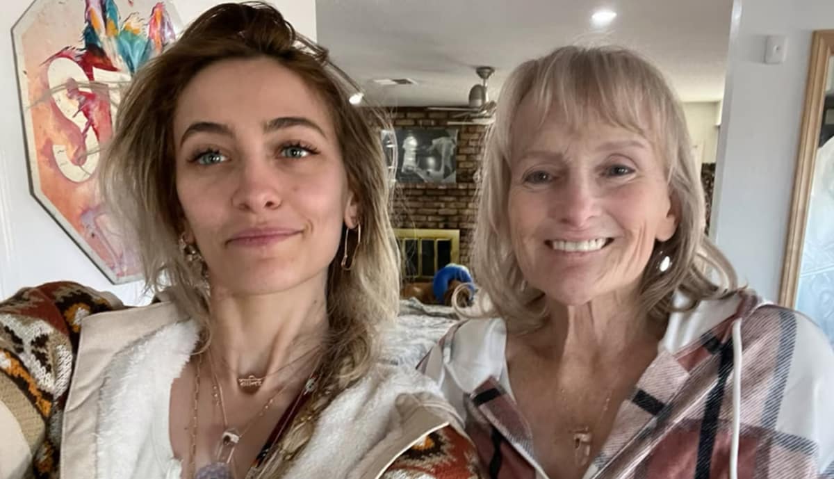 Paris Jackson and her mom are wearing matching necklaces. 