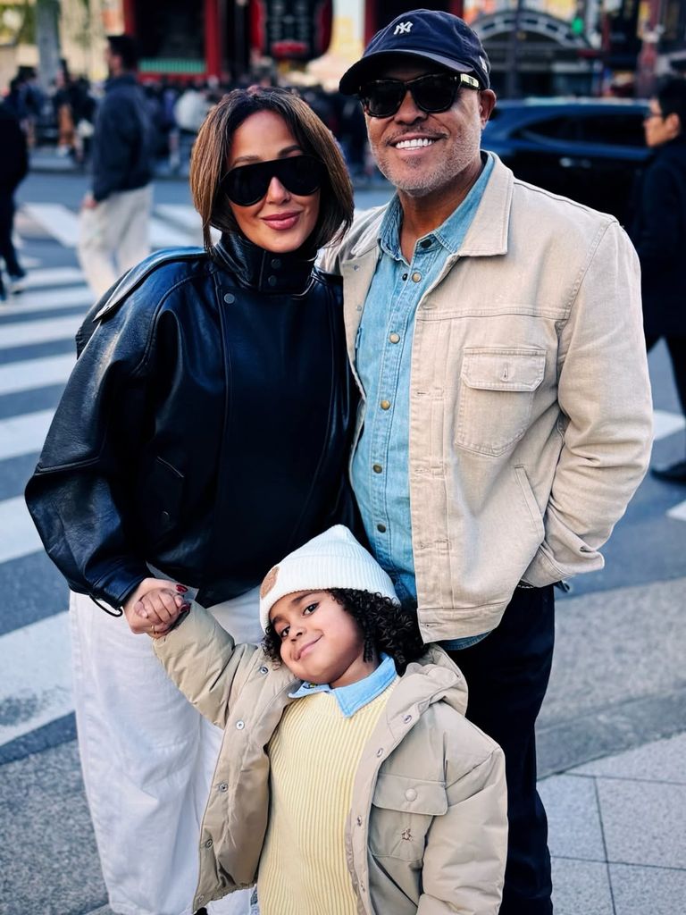 Adrienne Bailon, Israel Houghton, and their son on a trip in Japan