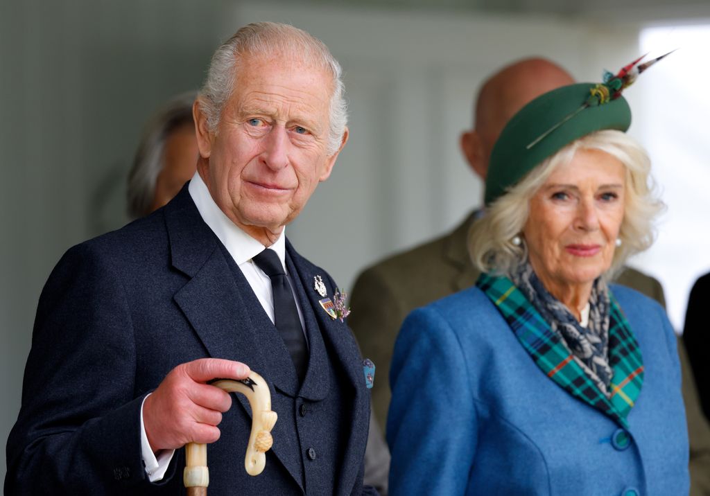 King Charles III (wearing a black tie following the death of Katharine, Duchess of Kent) and Queen Camilla attend the Braemar Royal Highland Gathering