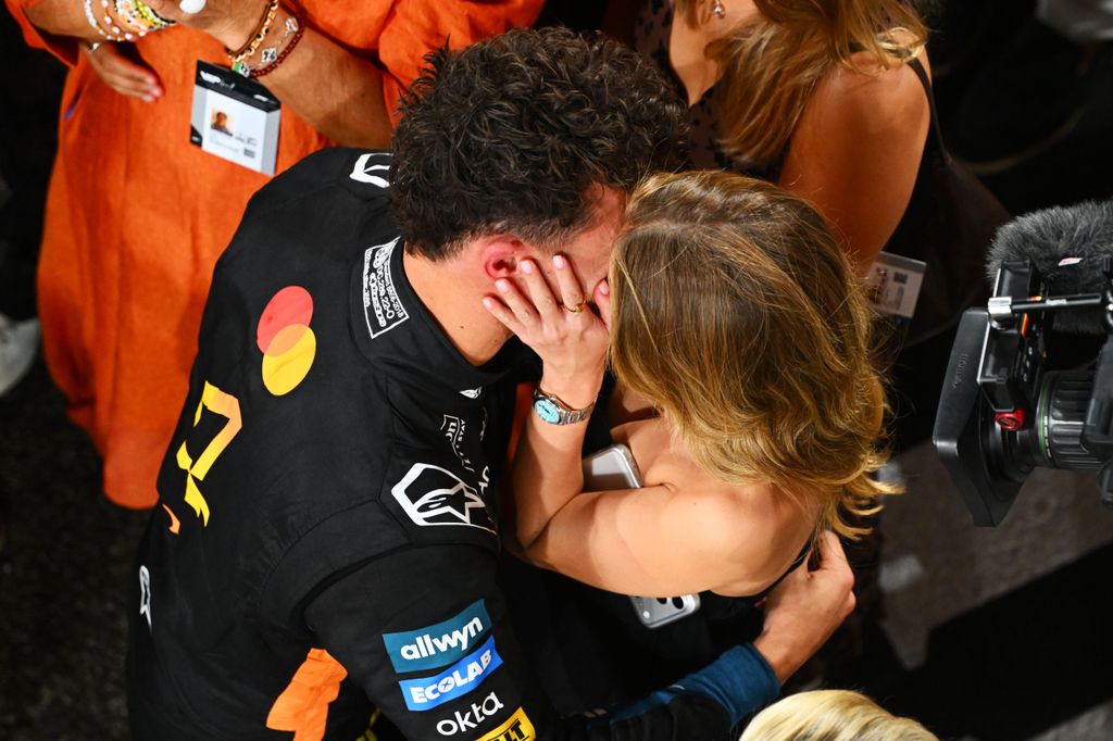  Lando Norris of Great Britain and McLaren celebrates in parc ferme with Magui Corceiro during the F1 Grand Prix of Abu Dhabi at Yas Marina Circuit on December 07, 2025 in Abu Dhabi, United Arab Emirates. (Photo by Mark Sutton - Formula 1/Formula 1 via Getty Images)