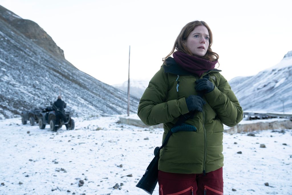 woman standing in snow
