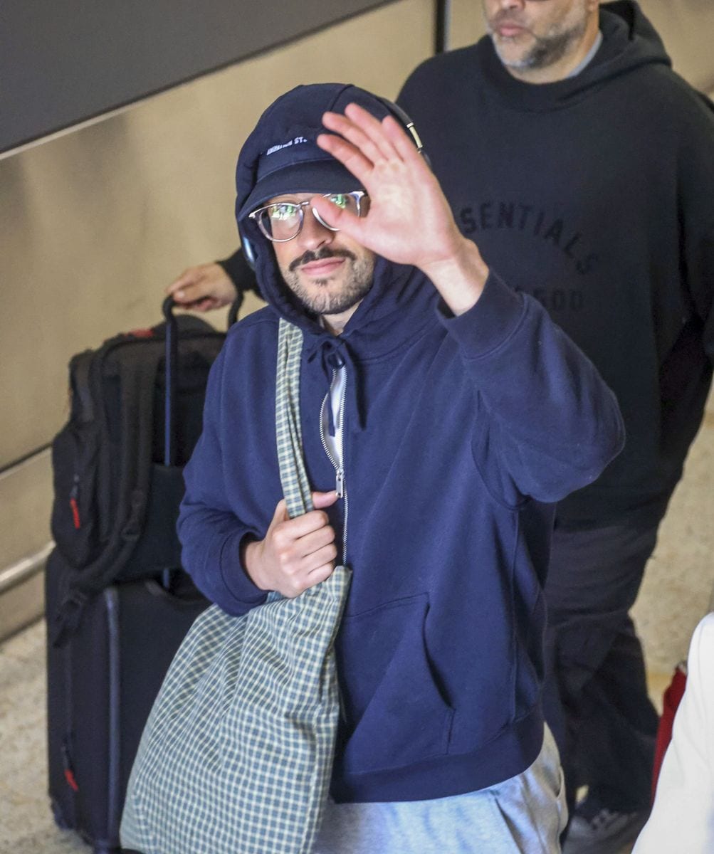 Bad Bunny was spotted arriving in Sydney after reportedly chartering a Qantas superjumbo for his crew, swapping first-class suites for first-class flip-flops as he made his way through arrivals.