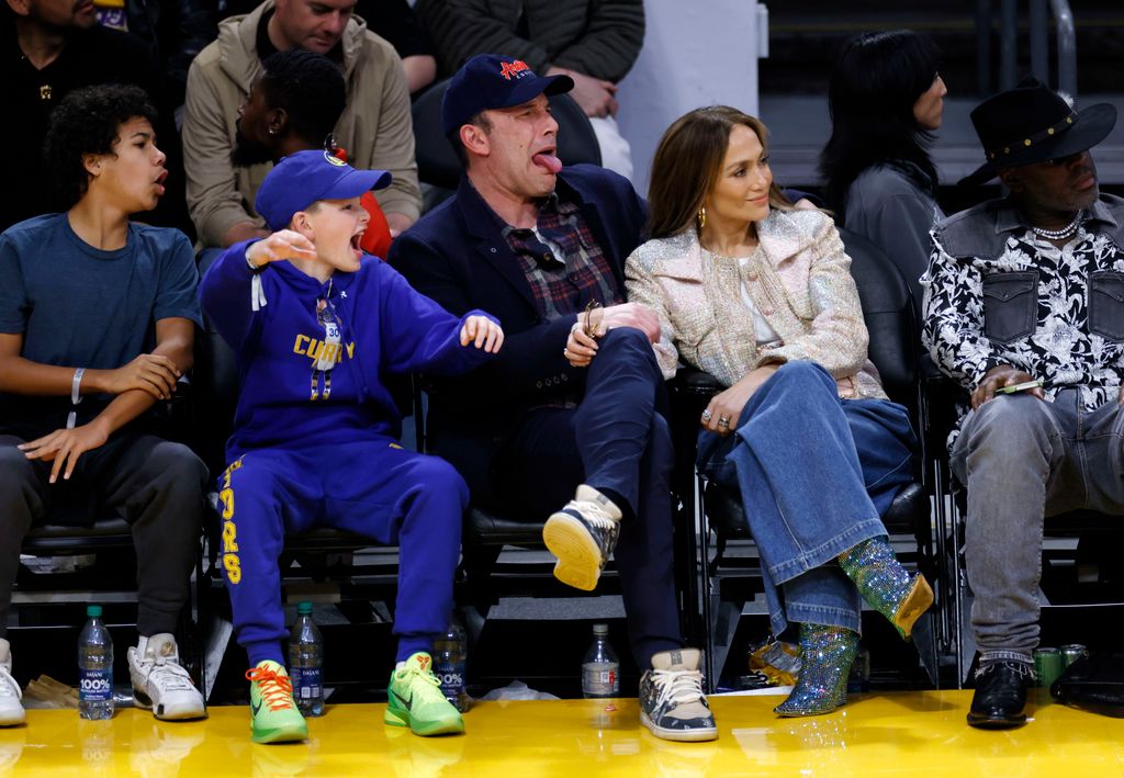 Jennifer Lopez, Ben Affleck and his son Samuel Garner Affleck attend a basketball game between the Los Angeles Lakers and Golden State Warriors at Crypto.com Arena on March 16, 2024 