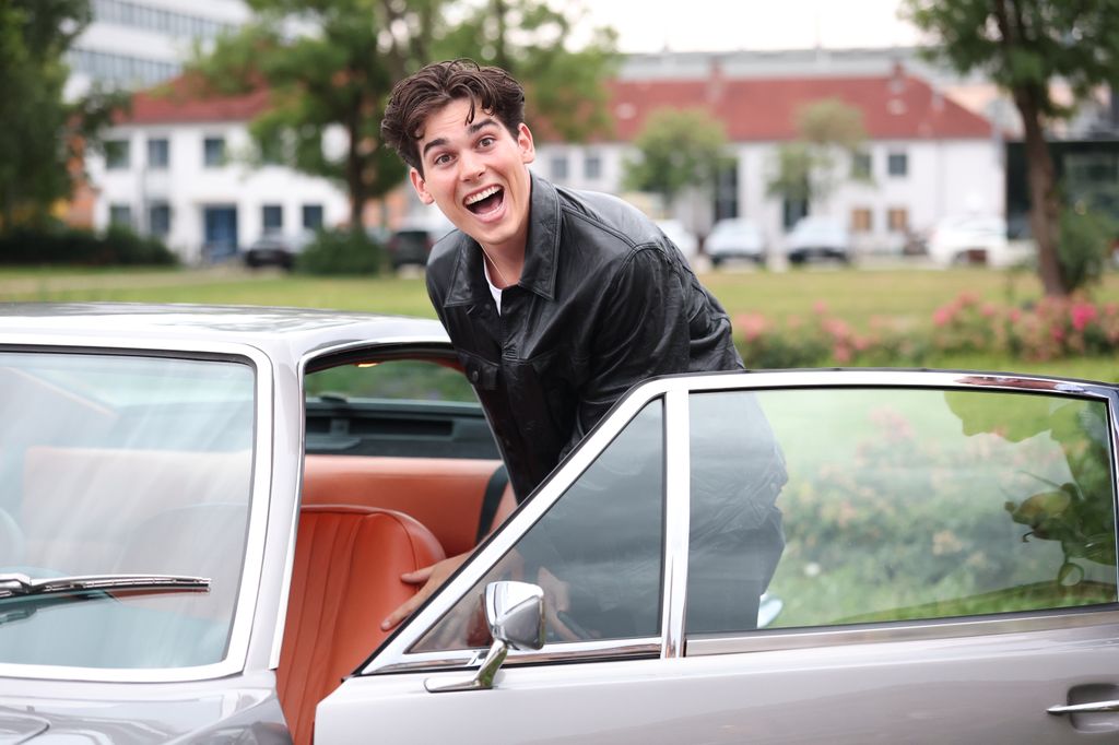 paris brosnan smiling car