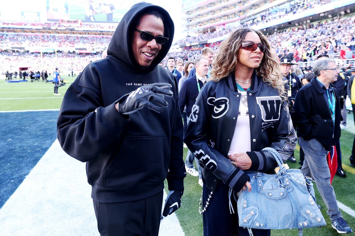 Jay-Z and daughter Blue Ivy Carter prior to the start of Super Bowl LX  between the Seattle Seahawks and the New England Patriots.
