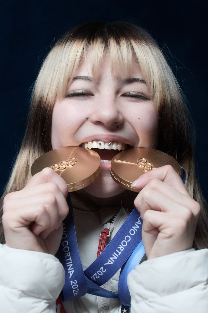 alysa liu biting gold medals