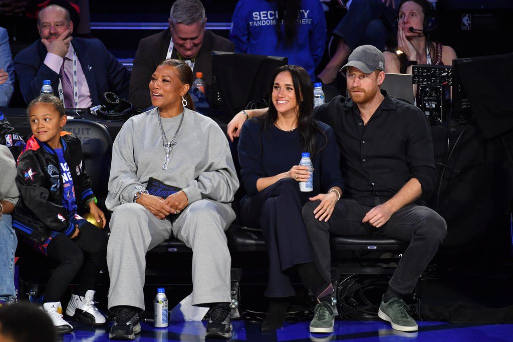(L-R) Queen Latifah, Meghan, Duchess of Sussex and Prince Harry, Duke of Sussex 
