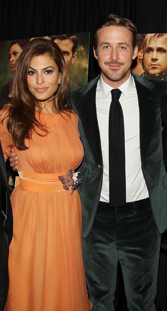 eva mendes ryan gosling standing together 2011
