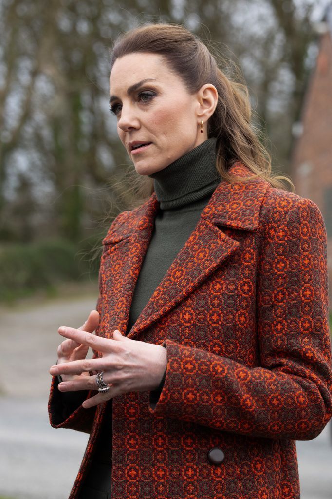 Catherine, Princess of Wales in printed orange coat
