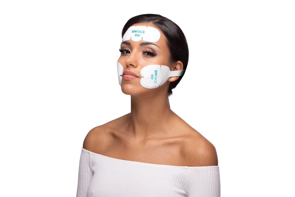 Emface pads are applied to the forehead and cheeks