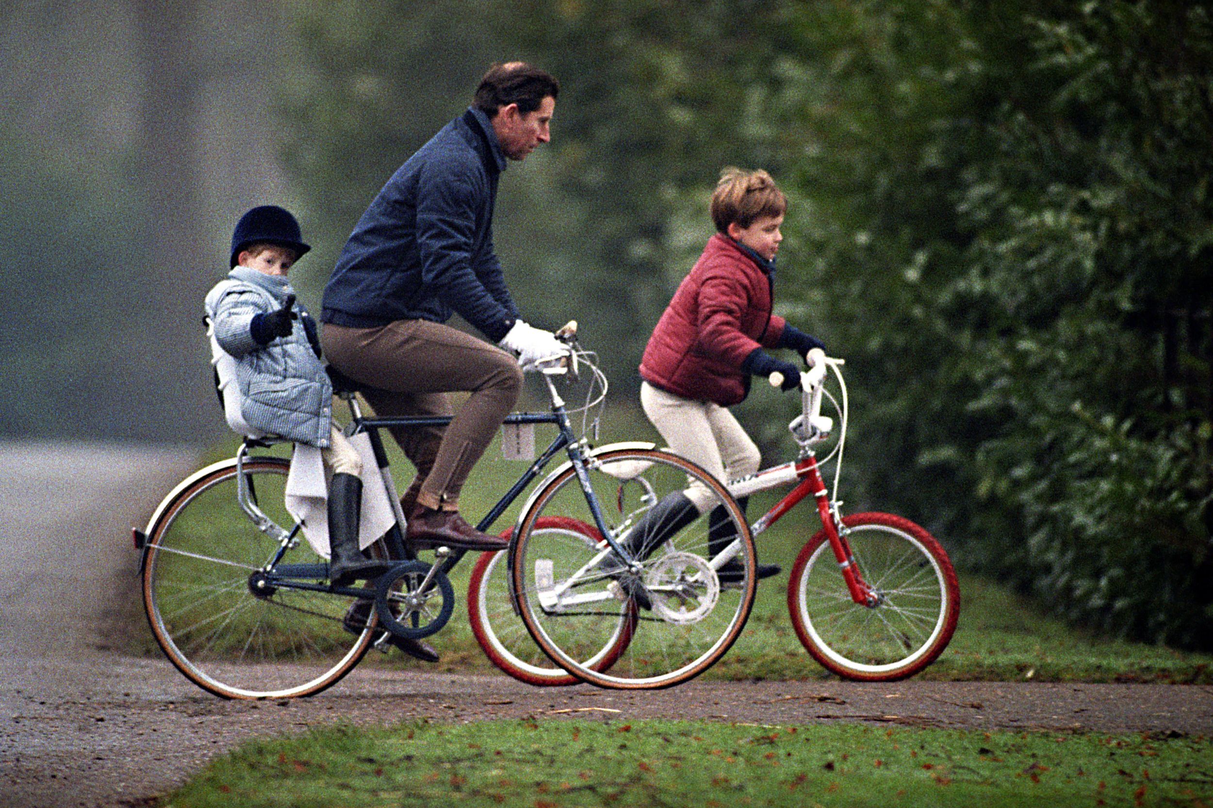 Harry pictured with his father and brother in 1990 in Norfolk