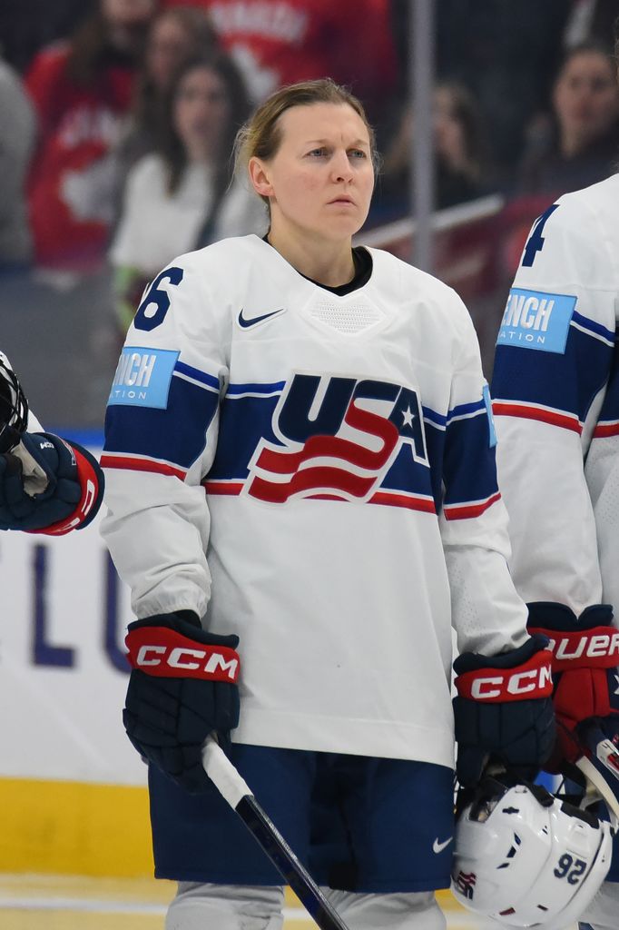 Kendall Coyne Schofield #26 of Team USA stands for the singing of the national anthem