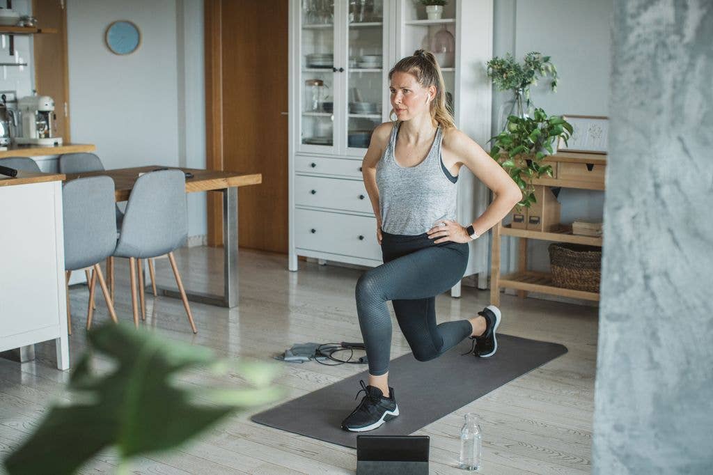 Women at home doing cardio workout to stay in shape