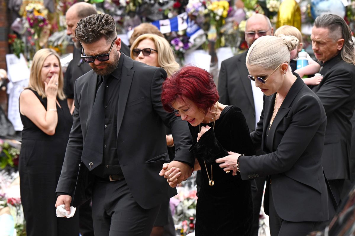 Jack, Sharon and Kelly Osbourne viewing Ozzy Osbourne tributes from fans on July 30, 2025
