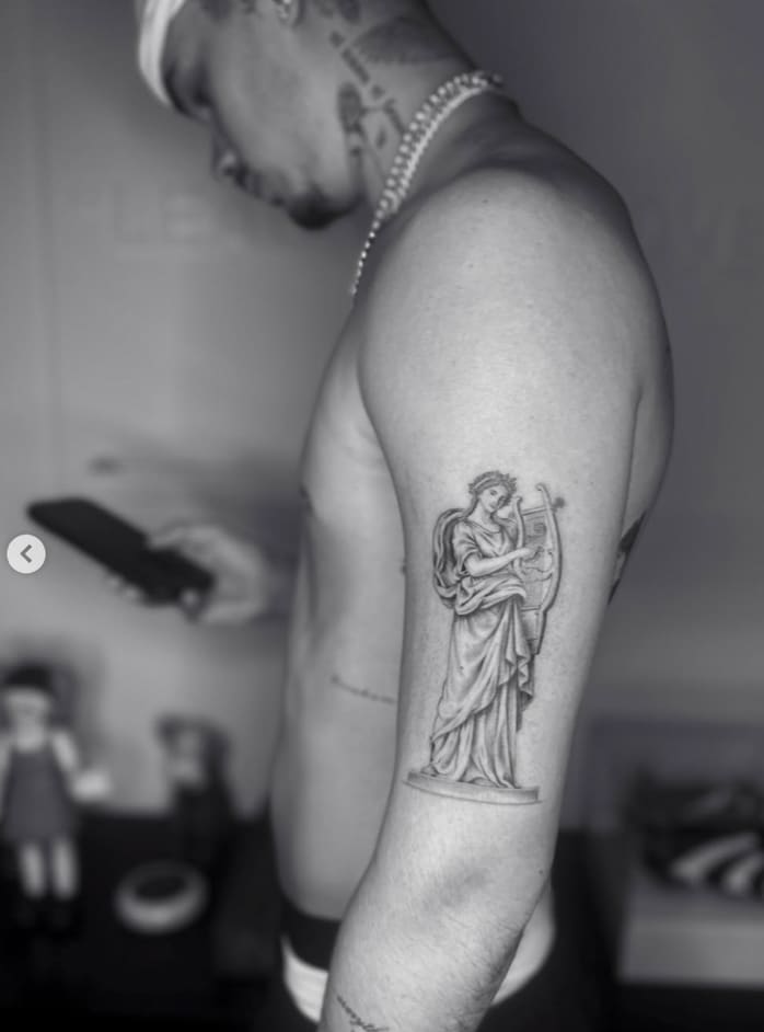 The piece was inked by artist Jesus at London’s Fine Line Hearts Club and adds to a remarkable collection of over 70 tattoos, turning his body into a canvas that maps his life, values, and relationships.