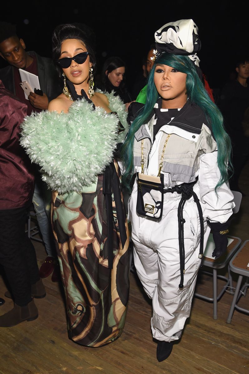 Cardi B (L) and Lil Kim attend the Marc Jacobs Fall 2018 Show at Park Avenue Armory on February 14, 2018 in New York City. (Photo by Dimitrios Kambouris/Getty Images for Marc Jacobs)
