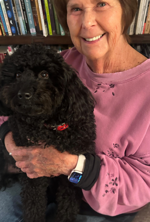 Savannah posted a photo of her mom snuggling a dog with the updated video