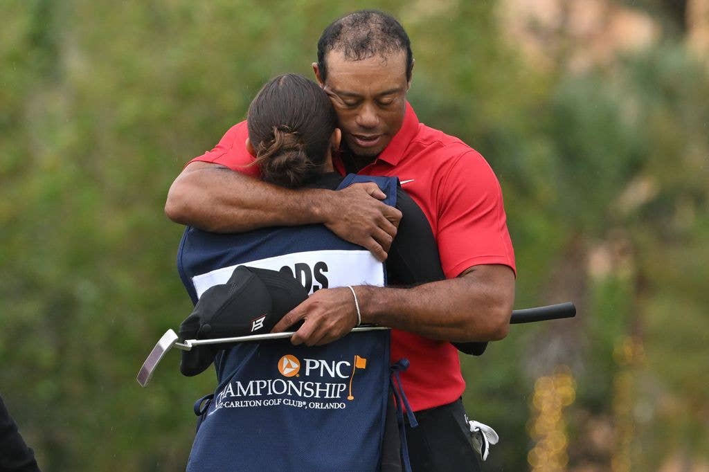 Tiger Woods hugging daughter Sam Woods 