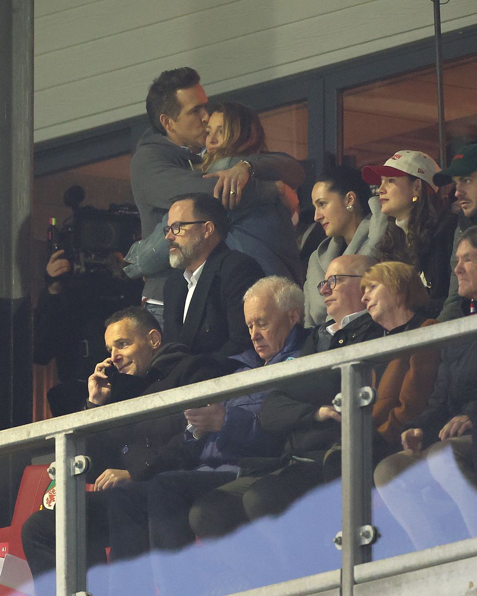 Ryan Reynolds, Actor and Co-Owner of Wrexham, embraces his wife and actress Blake Lively