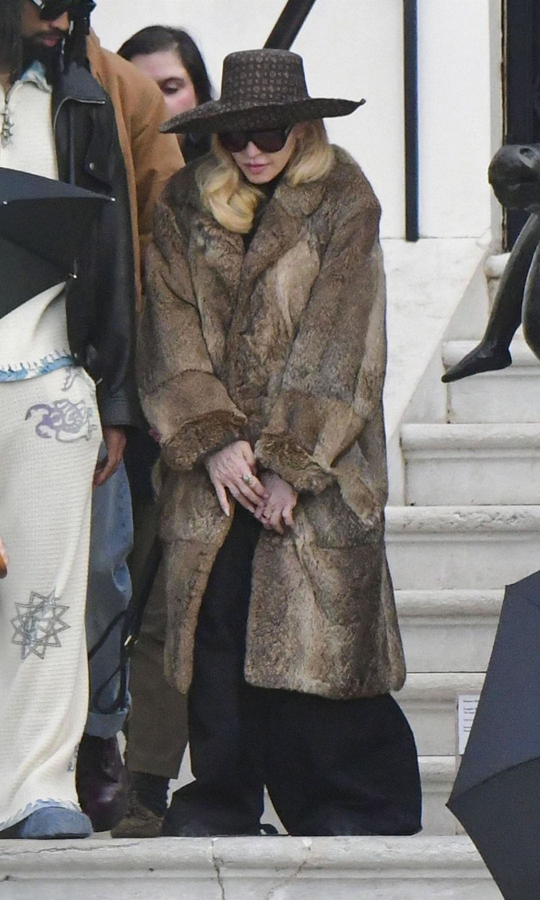 Madonna opted for a fur coat and a dramatic hat