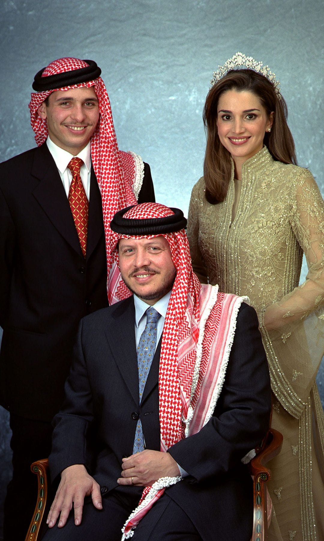 King of Jordan Abdullah II poses with his wife, Queen Rania and his brother, Crown Prince Hamzeh in 2000
