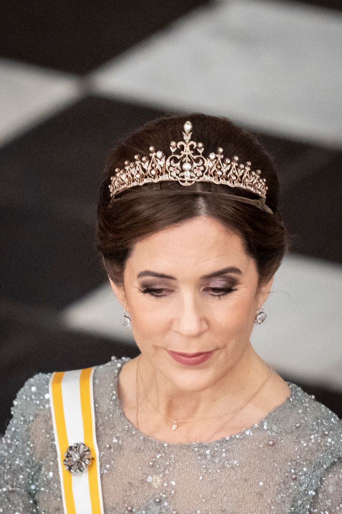 Mary looking down wearing tiara