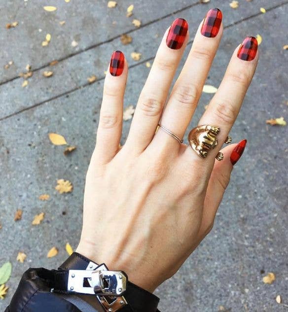 Red gingham checked pattern on short, square-shaped nails.