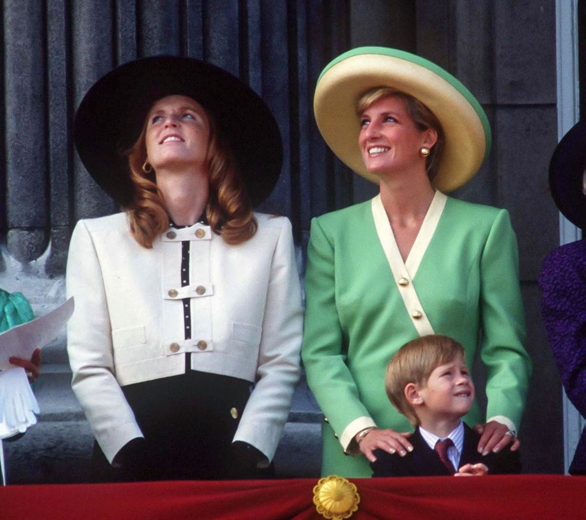 Diana, Princess of Wales ,and Sarah, Duchess of York, and Prince Harry, attend the 50th Anniversary of The Battle of Britain Parade, on the balcony of Buckingham Palace, on September 15, 1990  in, London
