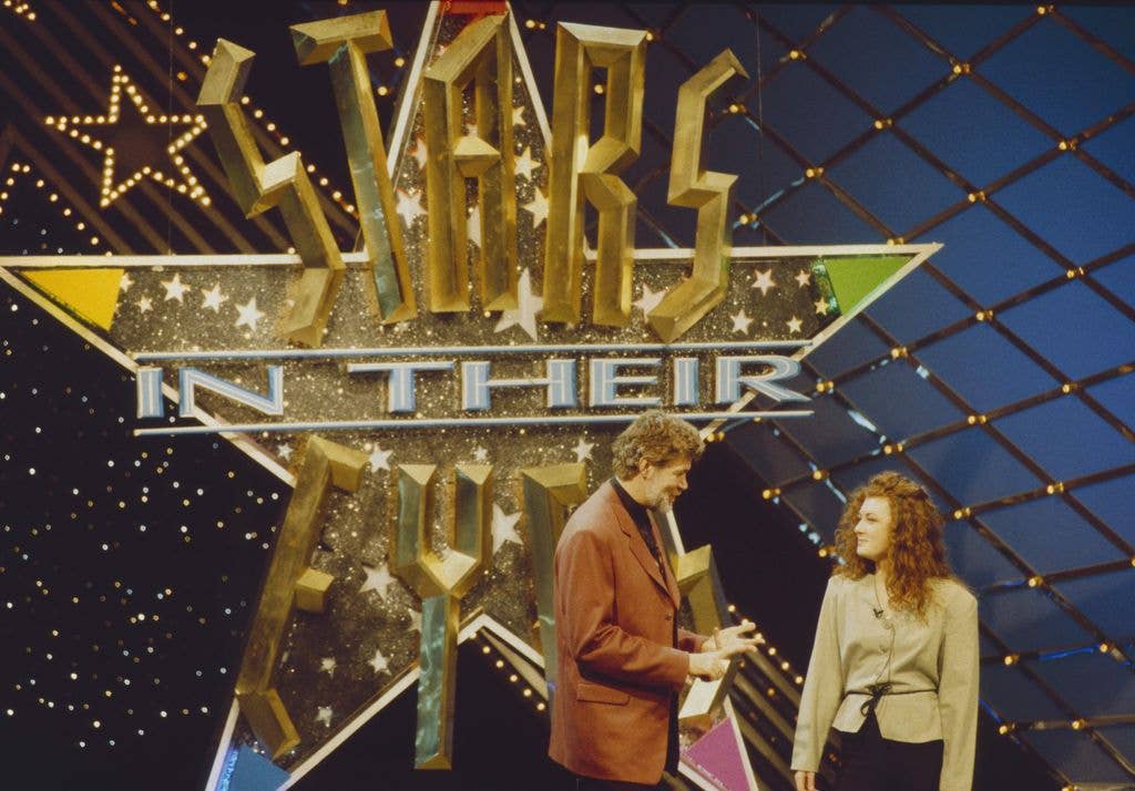 Host Matthew Kelly with contestant on set of Stars In Their Eyes TV show