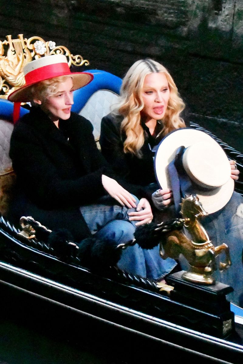 

Legendary 67-year-old singer Madonna and American actress Julia Garner are pictured taking part in a photo shoot aboard a gondola in Venice.

The singer and actress were photographed together on the iconic Venetian canal boat during the scenic shoot.