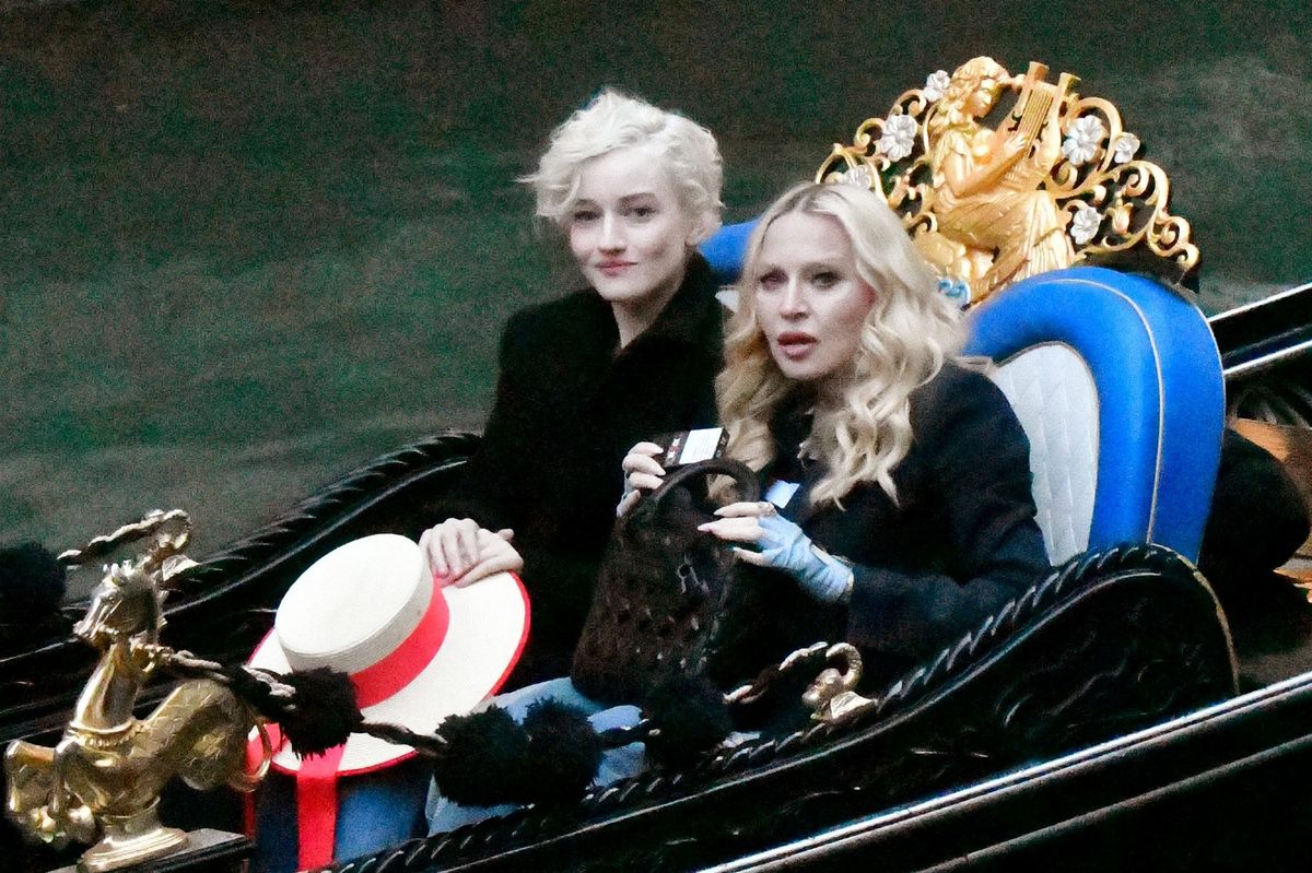 At one point, Madonna appeared to be directing attention toward something off-camera, while Garner listened attentively. 