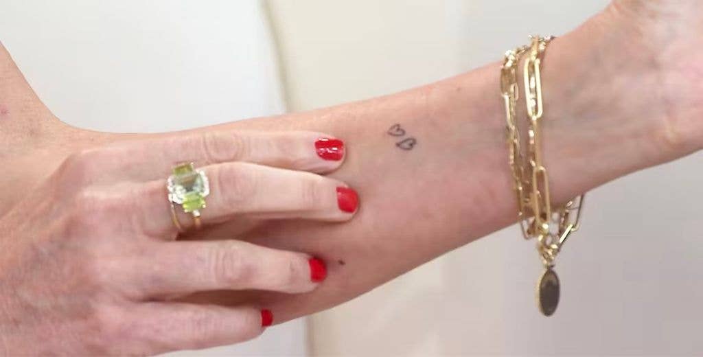 photo of savannah guthrie two hearts tattoo