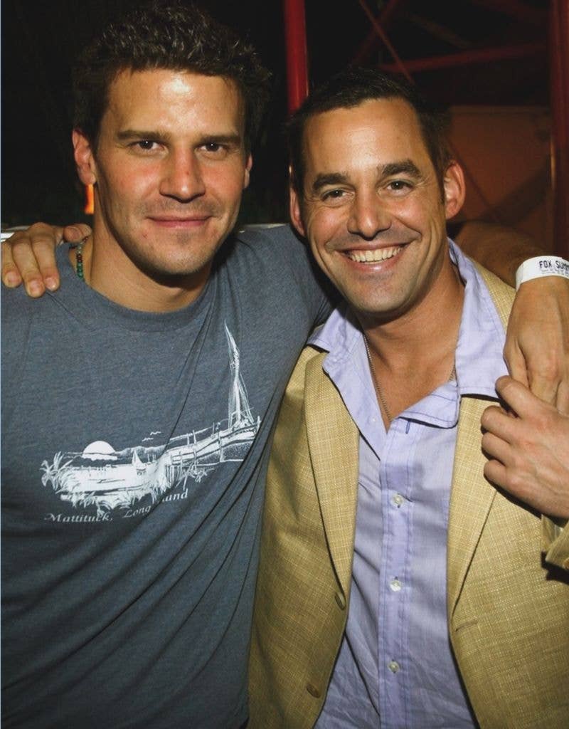 photo of David Boreanaz and Nicholas Brendon smiling with arms around each other