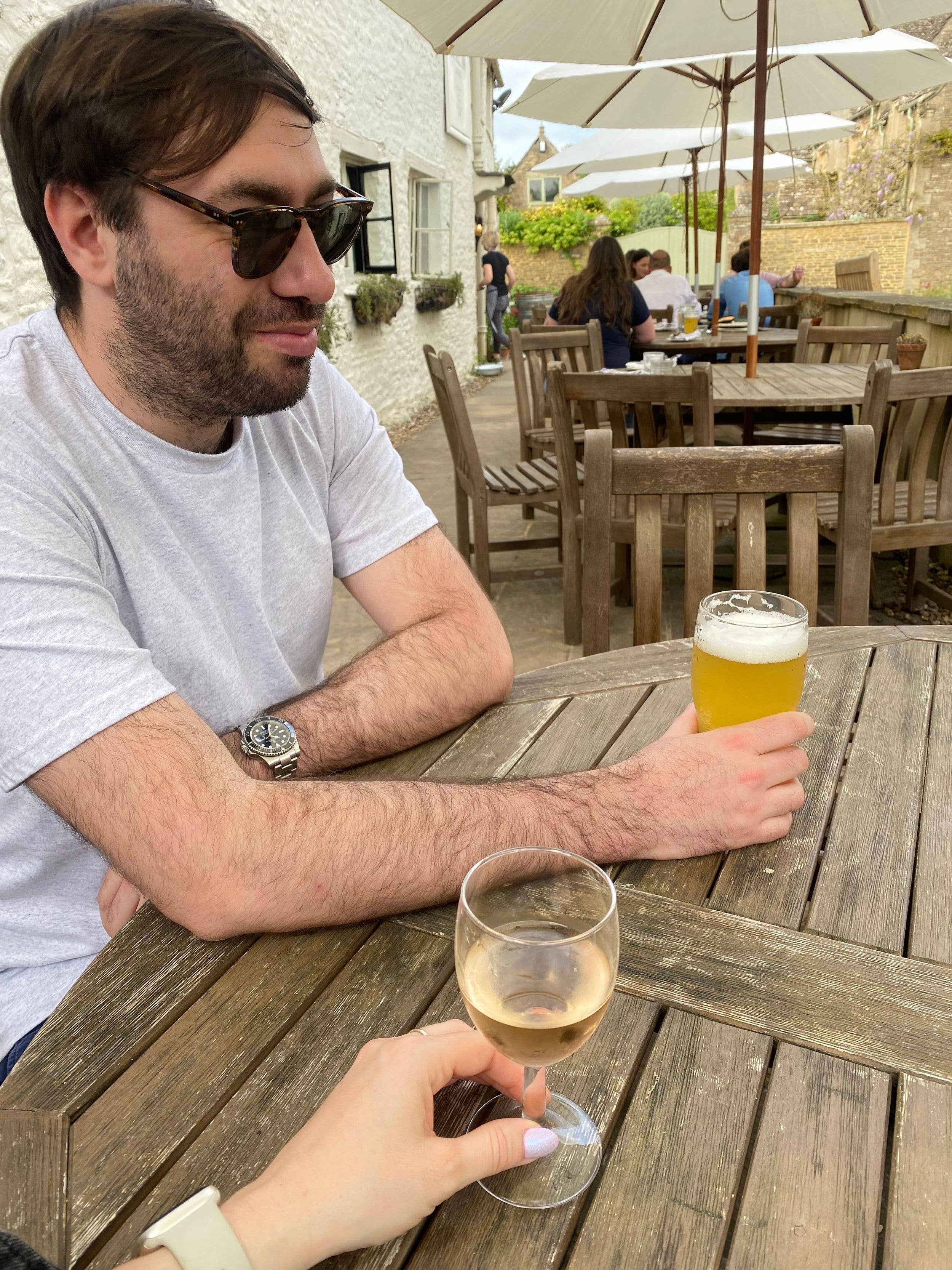 people drinking in a pun garden