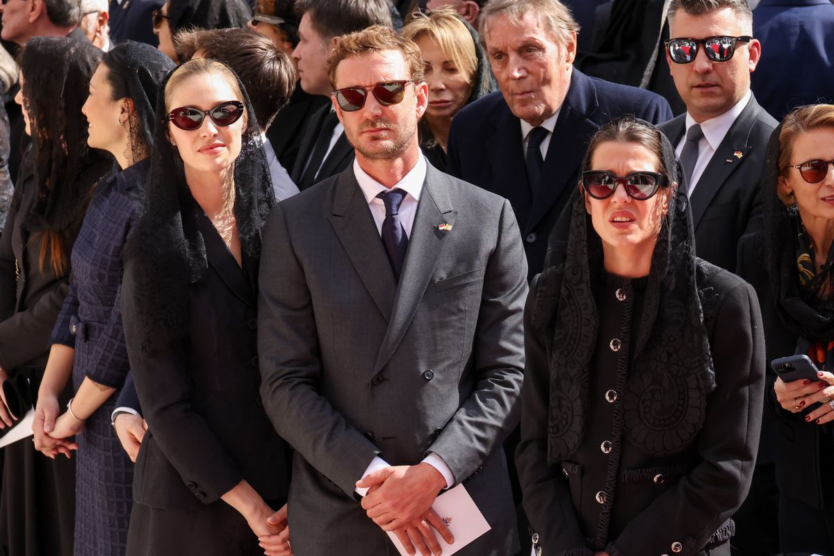 Beatrice Borromeo, Pierre Casiraghi and Charlotte Casiraghi attend a Holy Mass lead by Pope Leo XIV at the Louis II Stadium during the Pope Leo XIV visit to Monaco on March 28, 2026 in Monaco