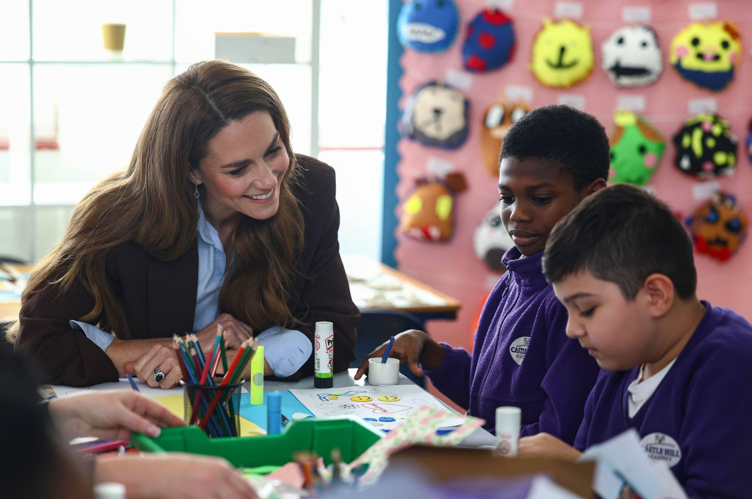 Kate Middleton talking to children